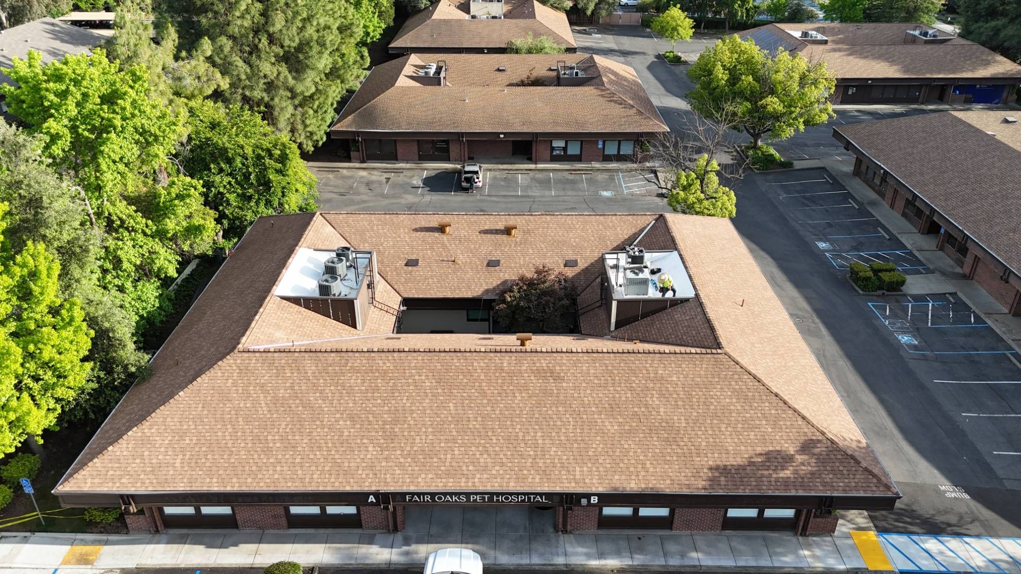 Aerial view of the Fair Oaks Pet Hospital with its new CertainTeed Resawn Shake roof